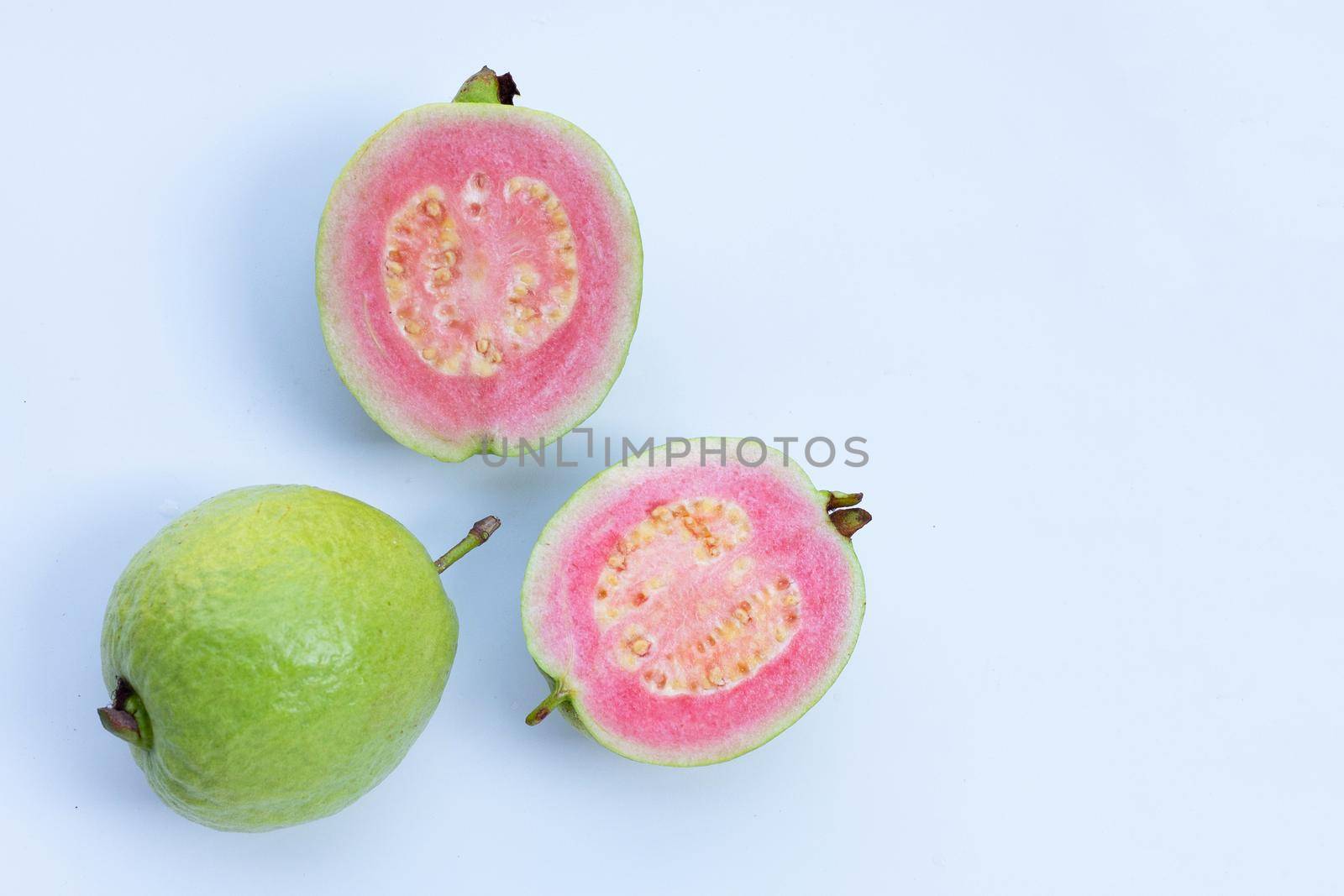 Pink guava on white background.