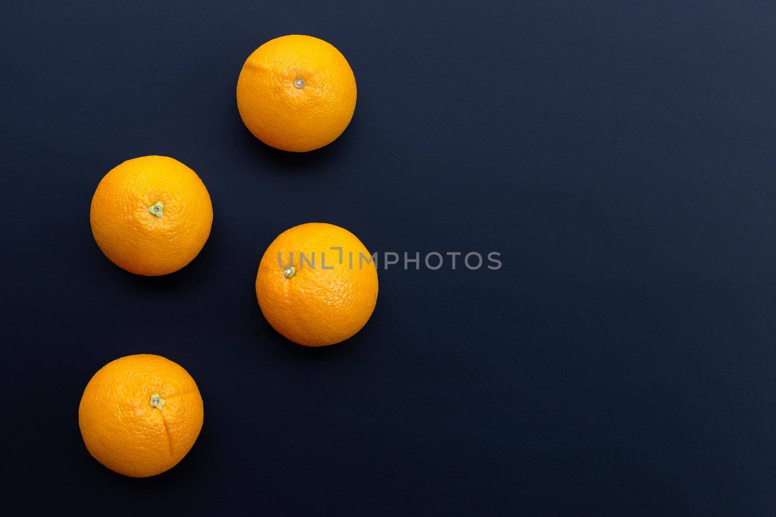 High vitamin C, Juicy and sweet. Fresh orange fruit on dark background.