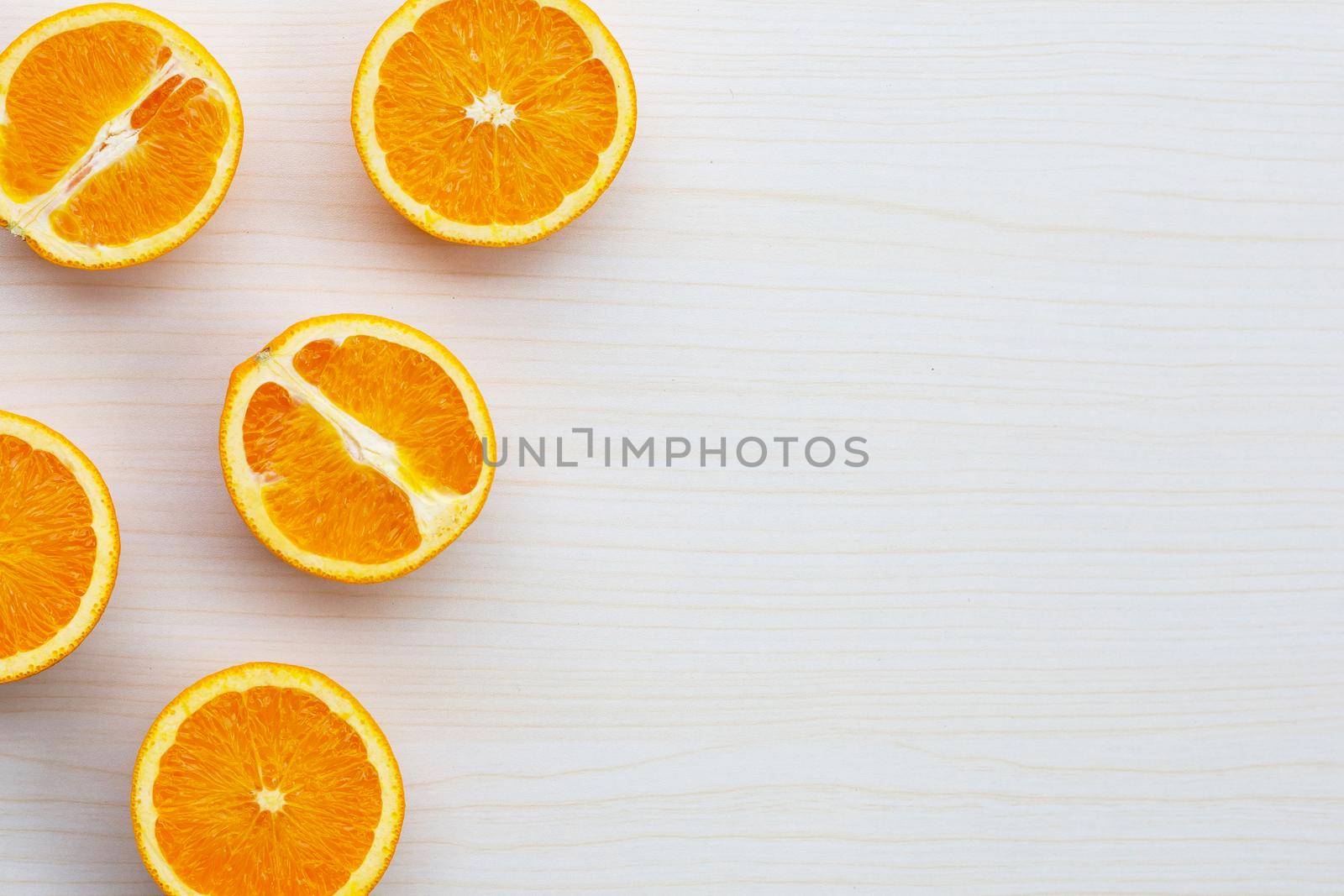 High vitamin C, Juicy and sweet. Fresh orange fruit on wooden texture background.