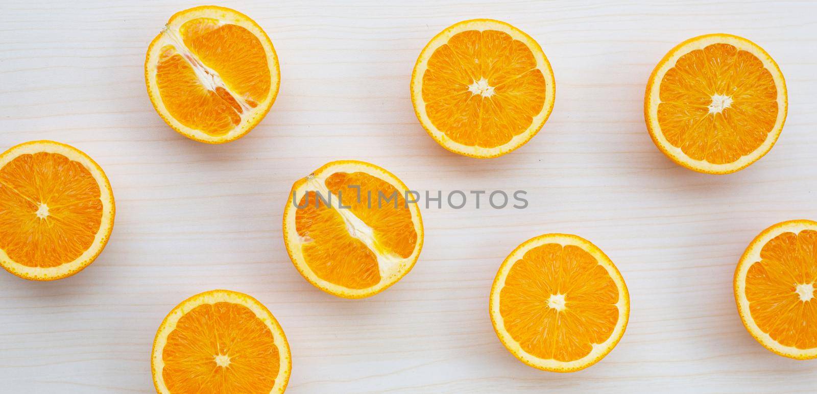 High vitamin C, Juicy and sweet. Fresh orange fruit on wooden texture background. by Bowonpat