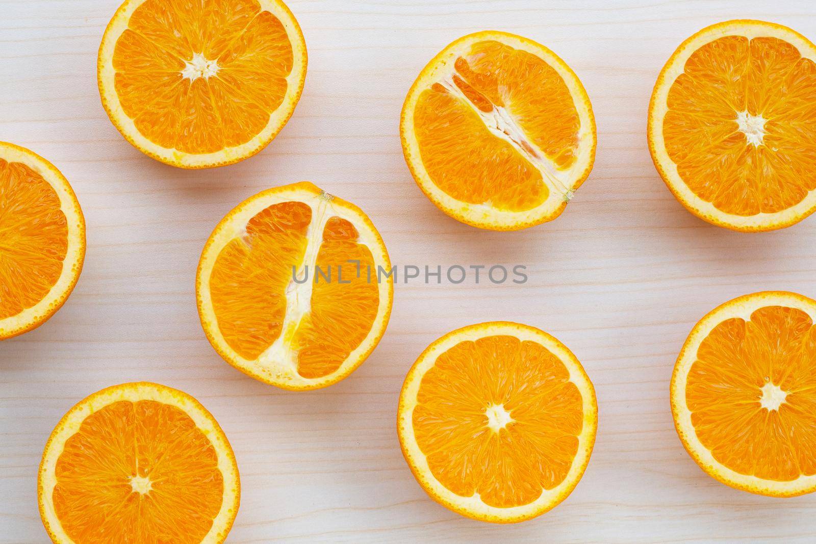High vitamin C, Juicy and sweet. Fresh orange fruit on wooden texture background.