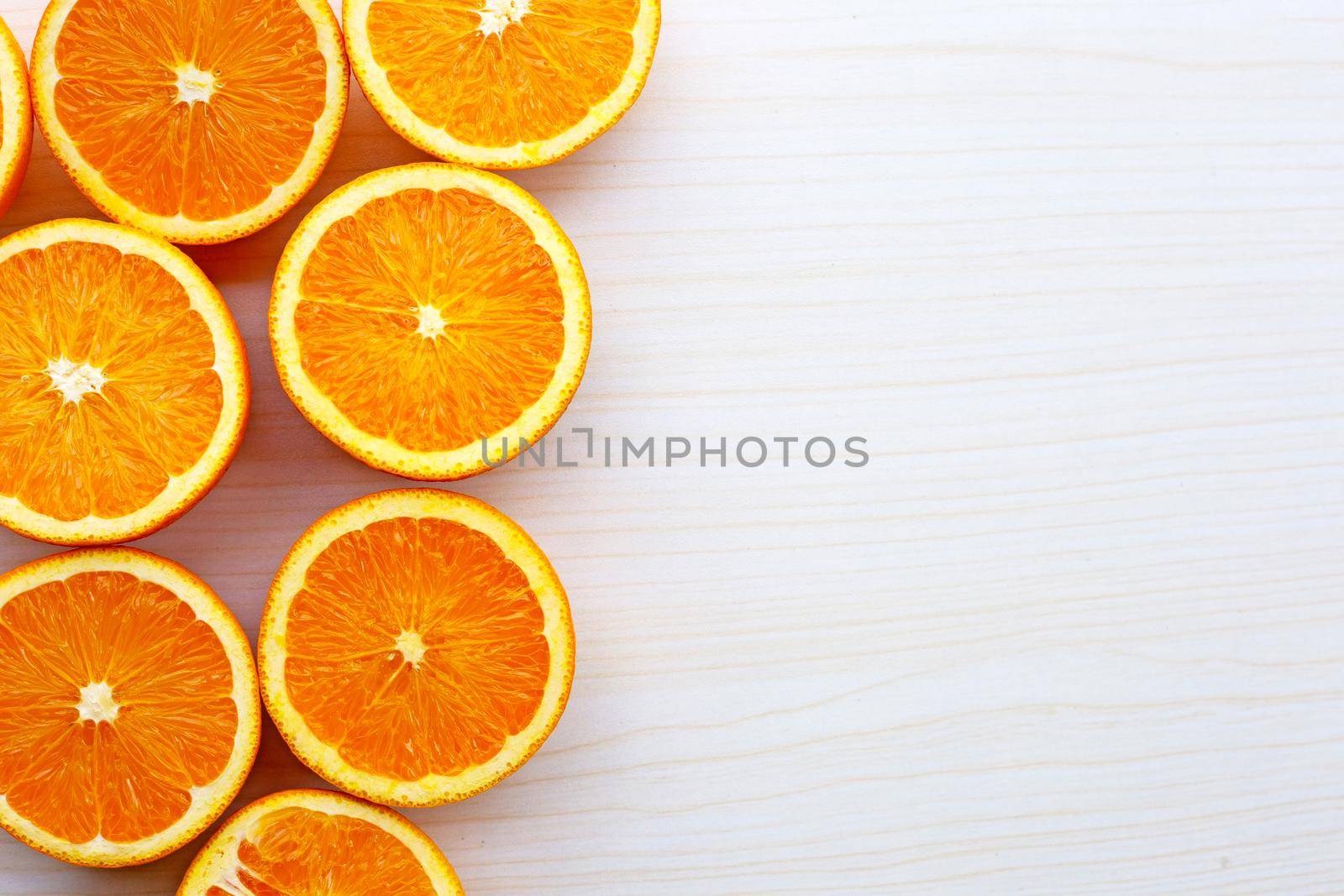 High vitamin C, Juicy and sweet. Fresh orange fruit on wooden texture background.