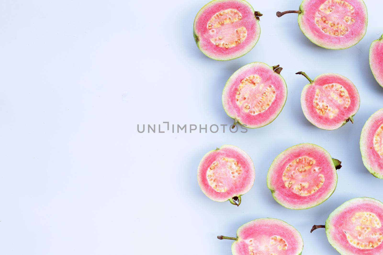 Pink guava on white background.