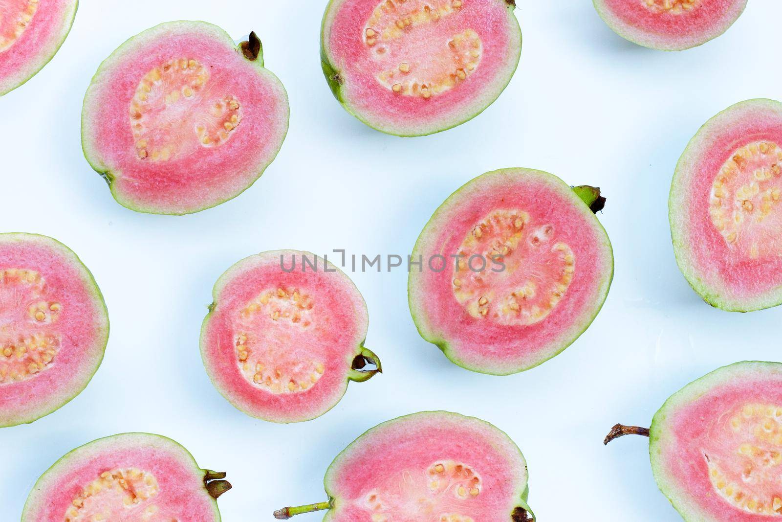 Pink guava on white background.