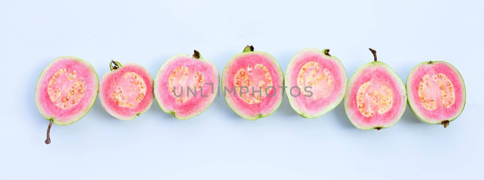 Pink guava on white background.