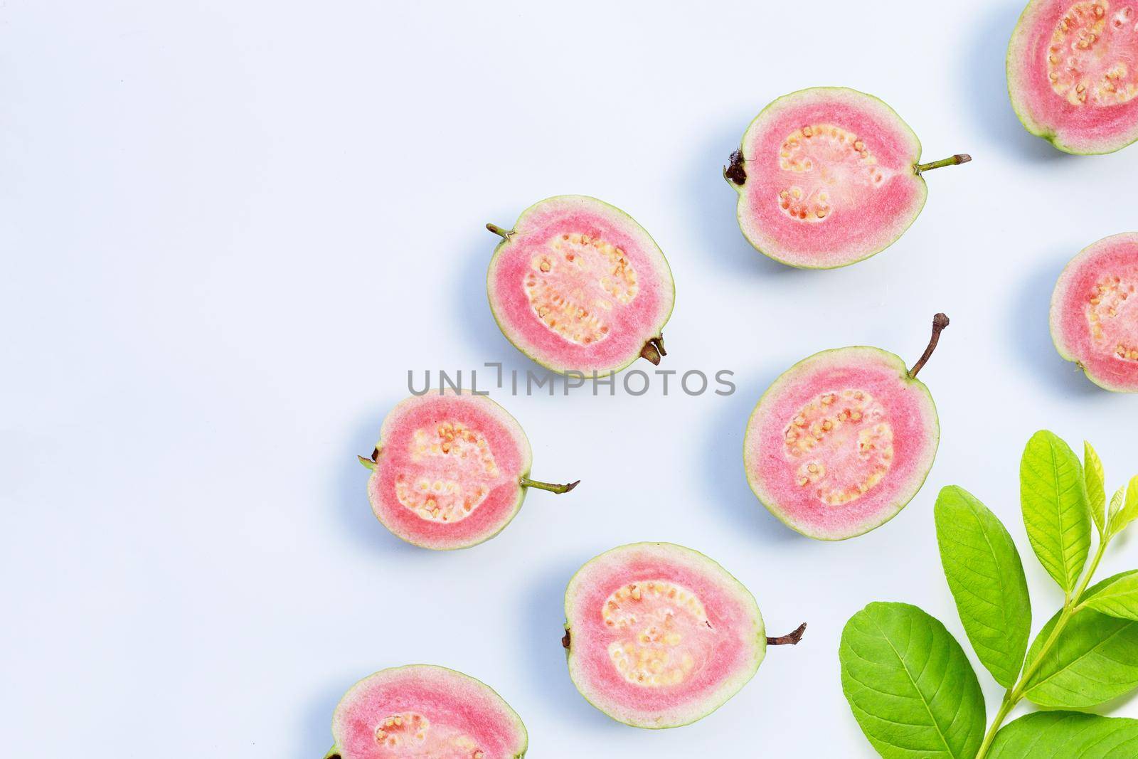 Pink guava on white background.