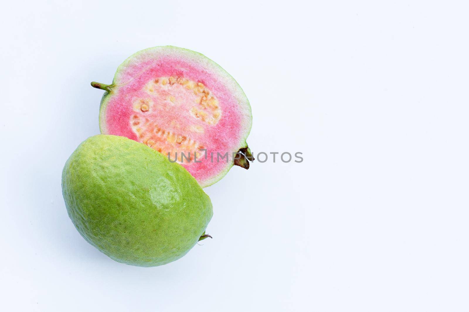 Pink guava on white background.