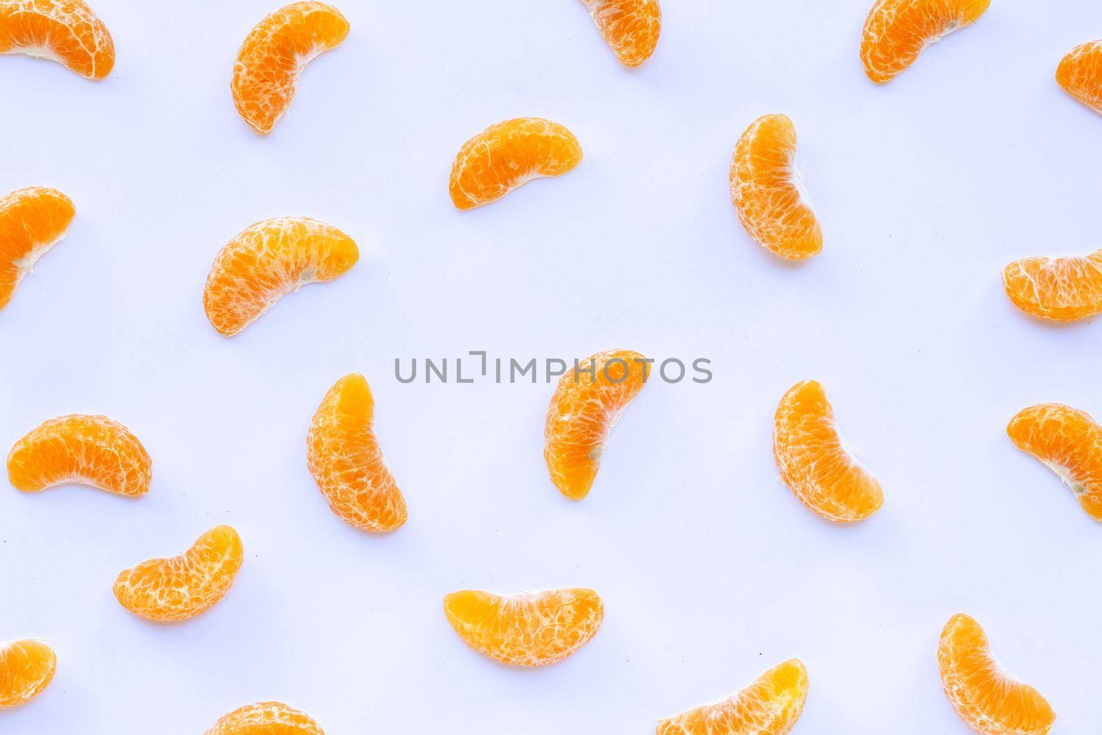 Mandarin segments, Fresh orange isolated on white background. Top view