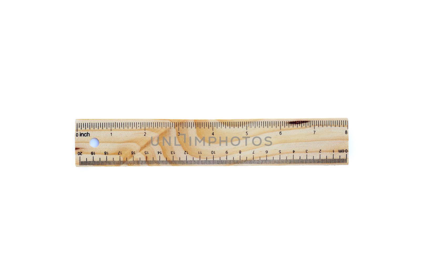 Wooden ruler isolated on white background.