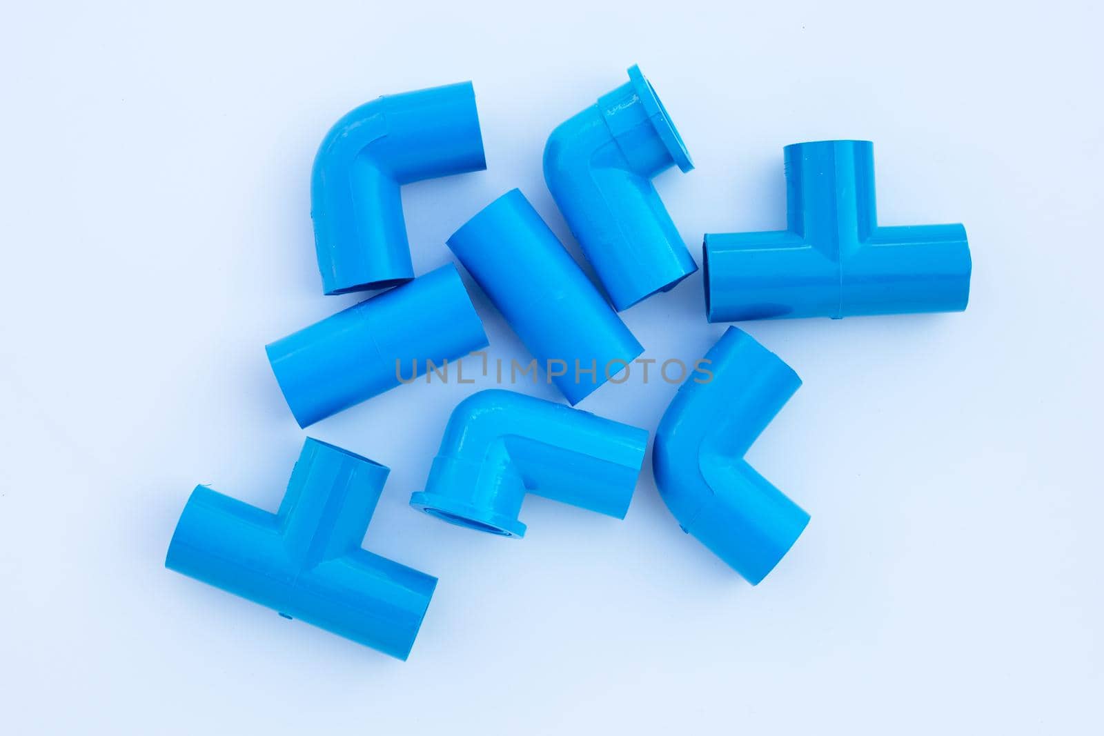 Blue pvc pipe connection isolated on white background.
