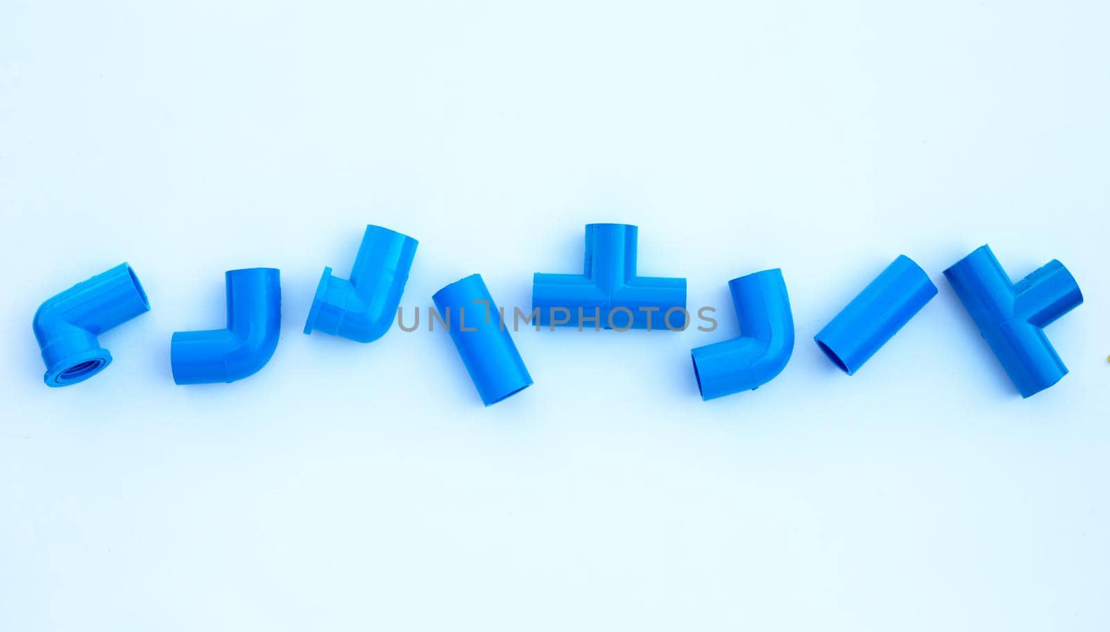 Blue pvc pipe connection isolated on white background.