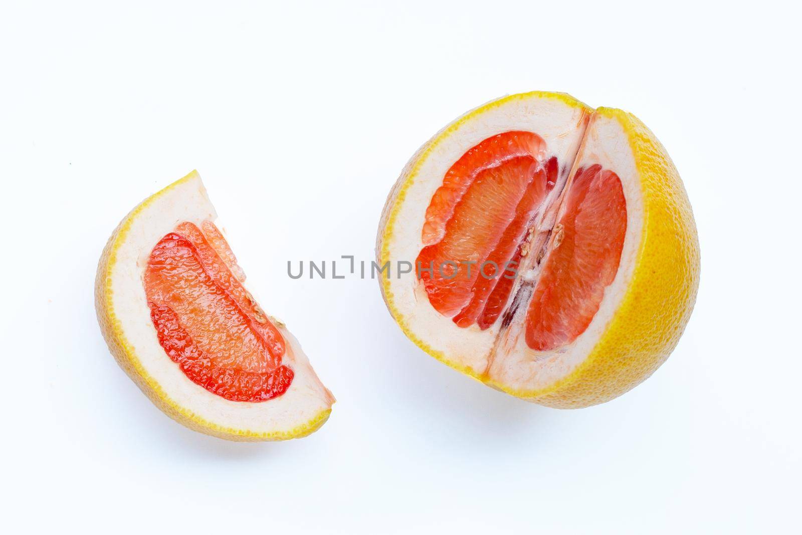 High vitamin C. Juicy grapefruit on white background.