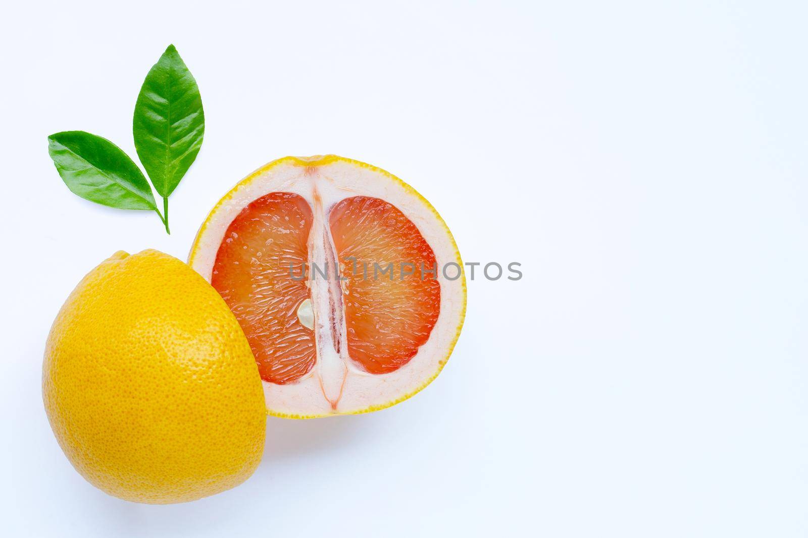 High vitamin C. Juicy grapefruit on white background.