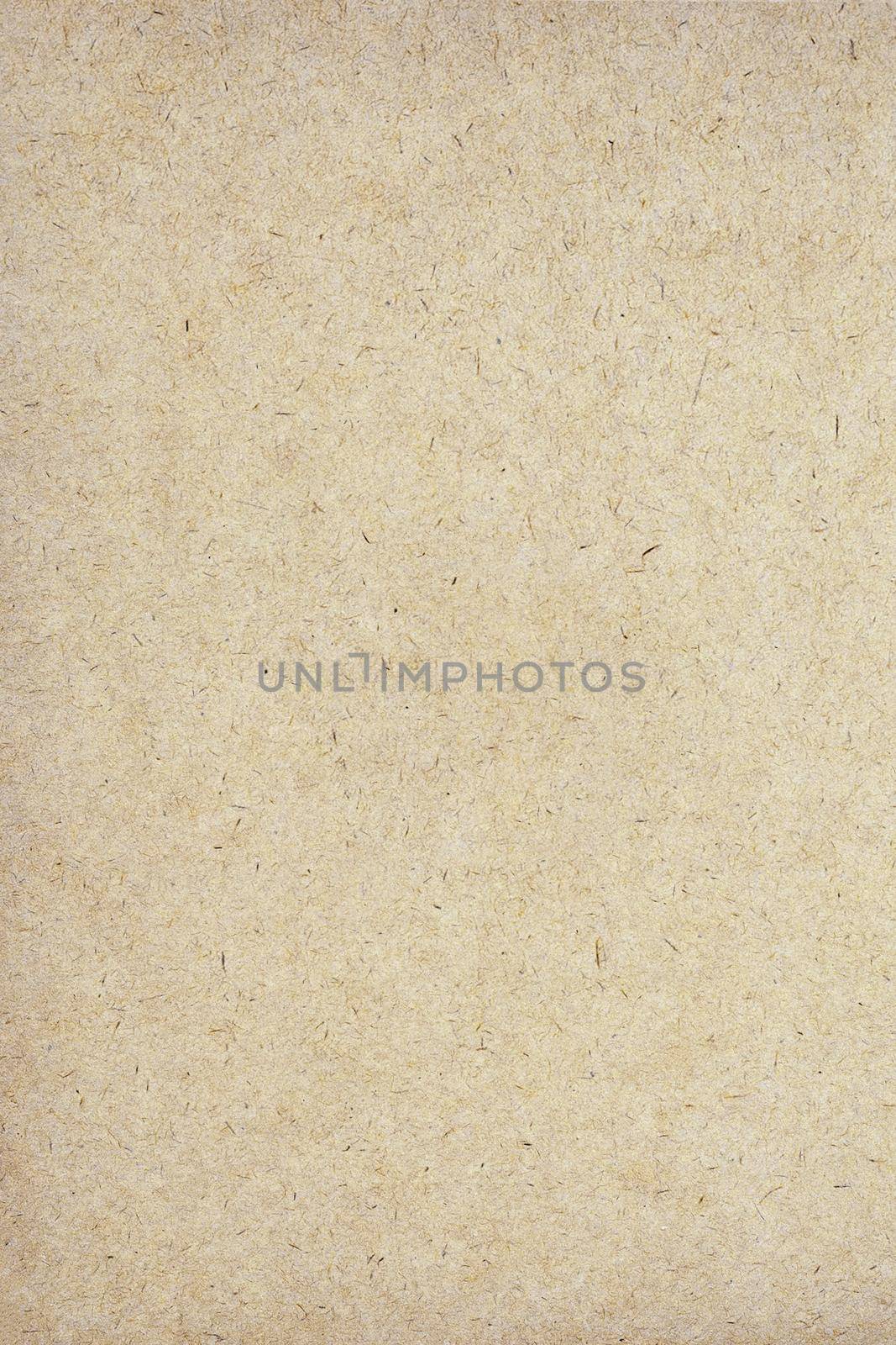 Sheet of brown paper or cardboard texture for background.