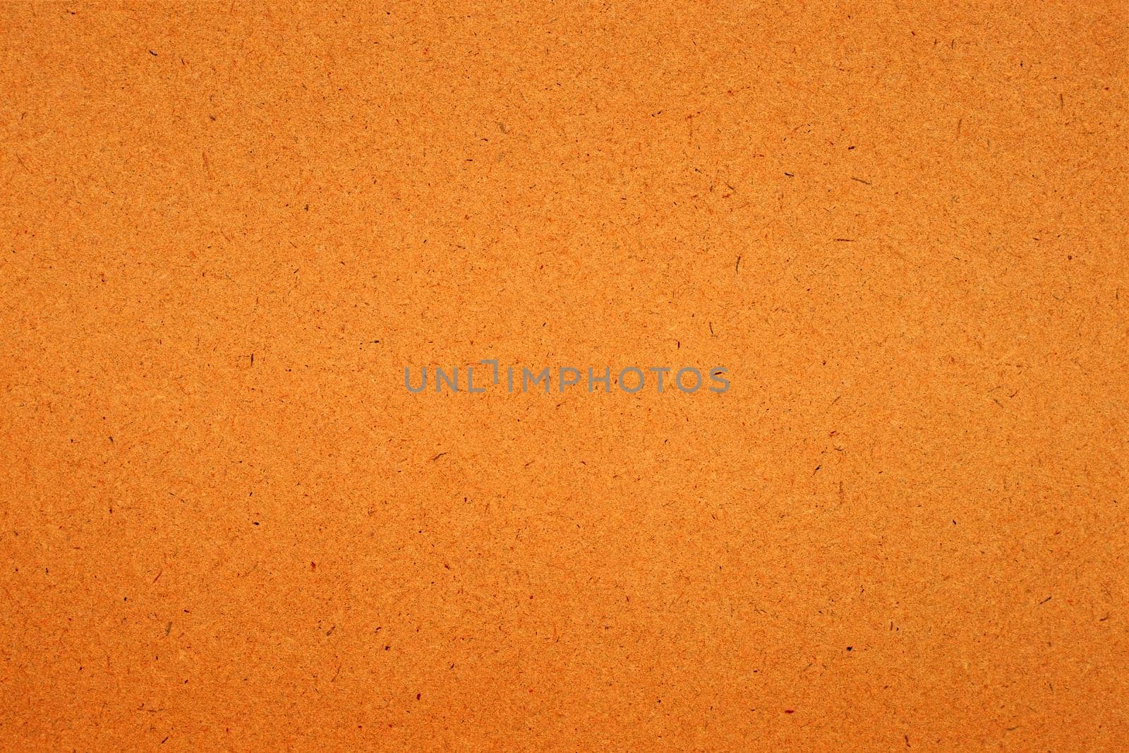 Sheet of brown paper texture for background.
