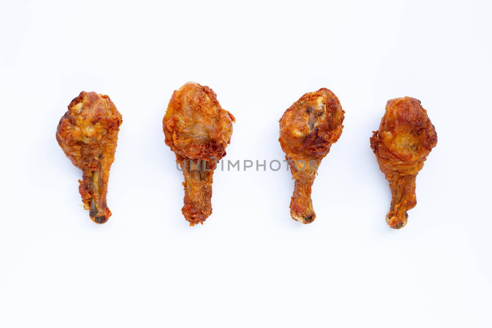 Fried chicken on white background. Copy space