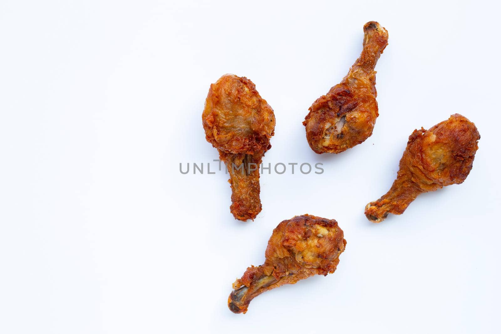 Fried chicken on white background. Copy space