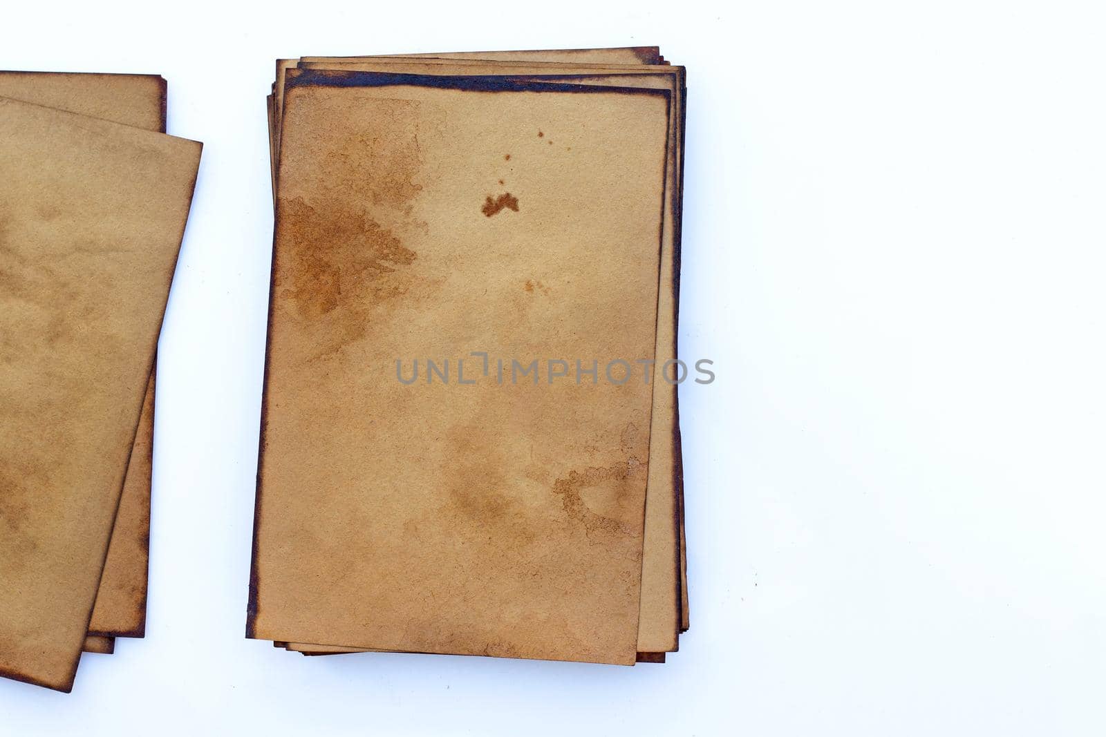 Old brown paper grunge background. Abstract liquid coffee color texture.