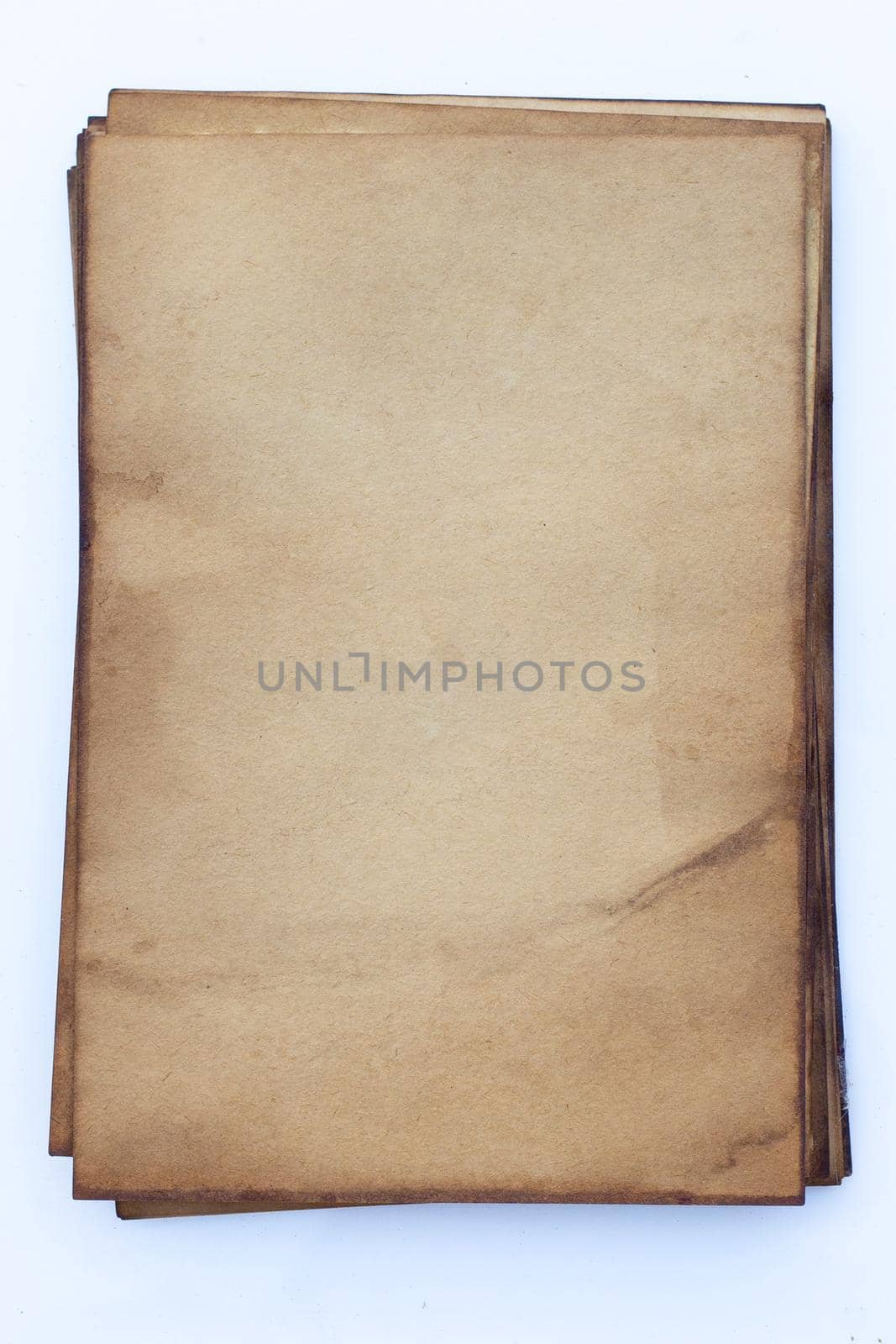 Old brown paper grunge background.  by Bowonpat