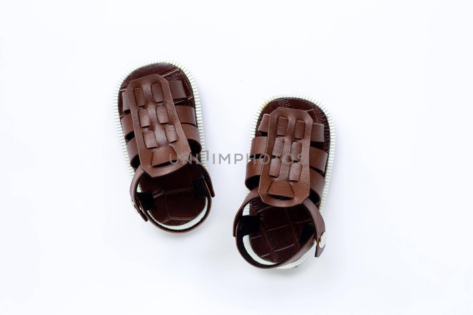 Children's shoes on white background. Top view