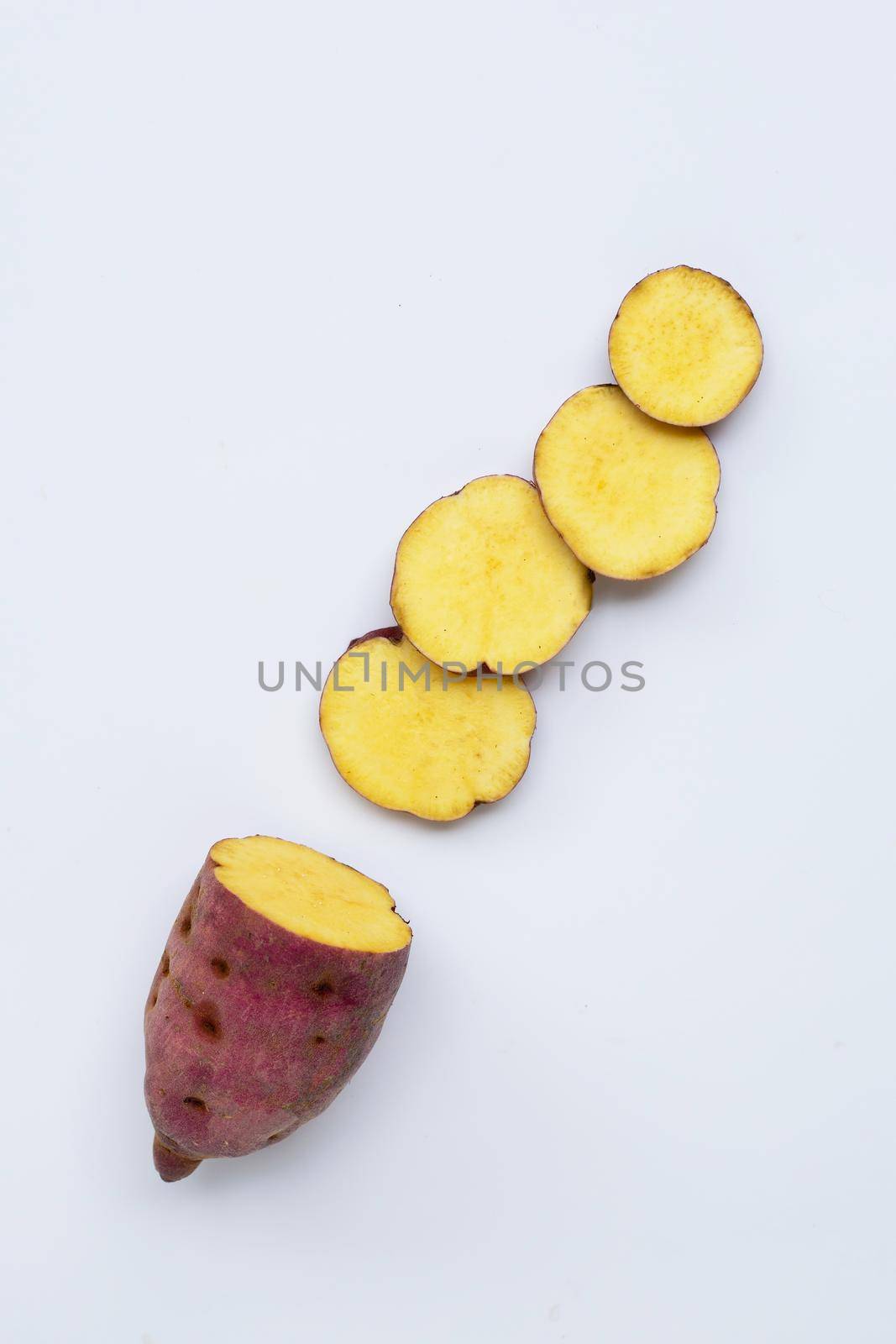 Sweet potato on white background. Top view