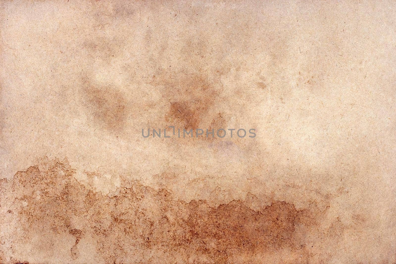 Old brown paper grunge background. Abstract liquid coffee color texture.