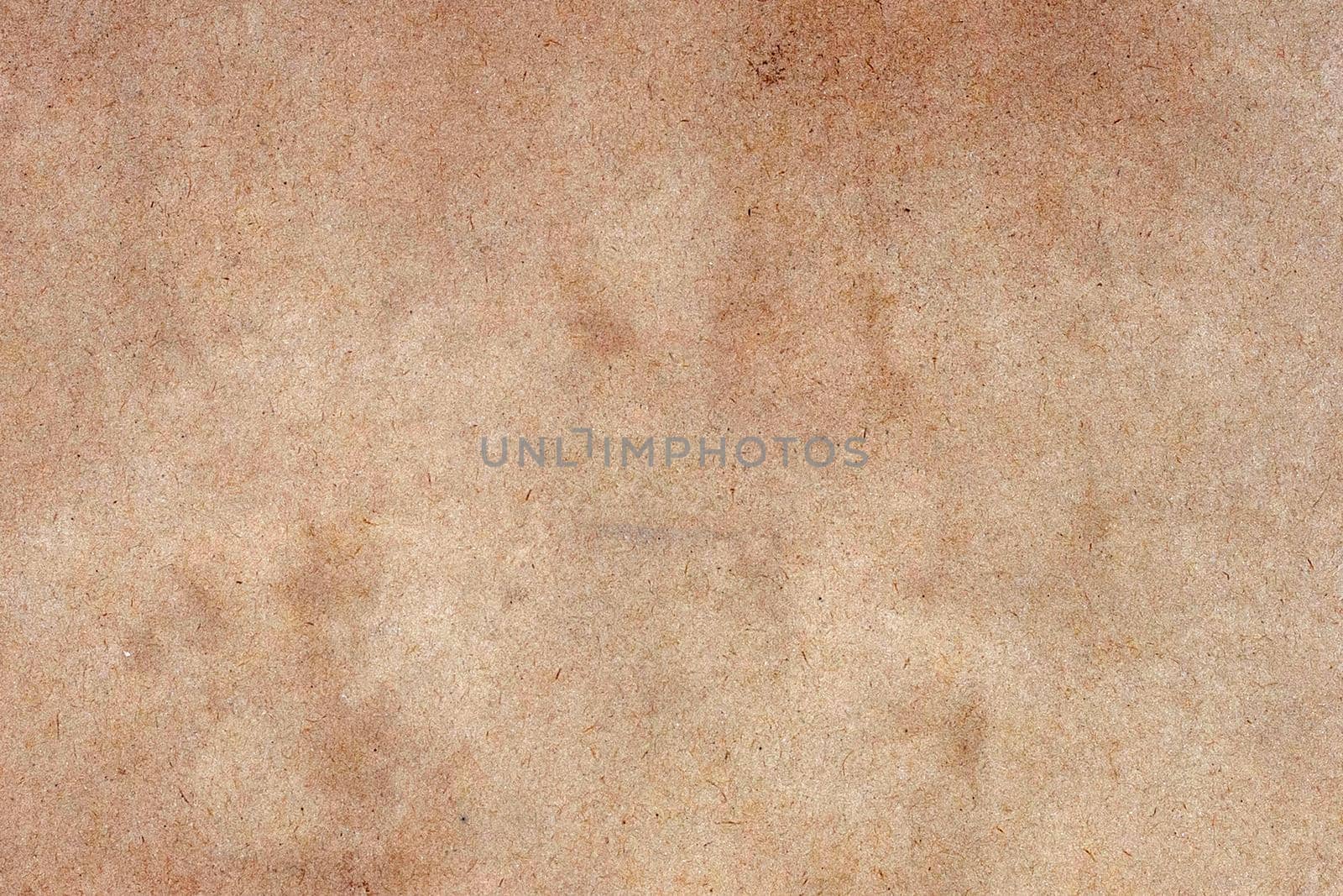 Old brown paper grunge background. Abstract liquid coffee color texture.