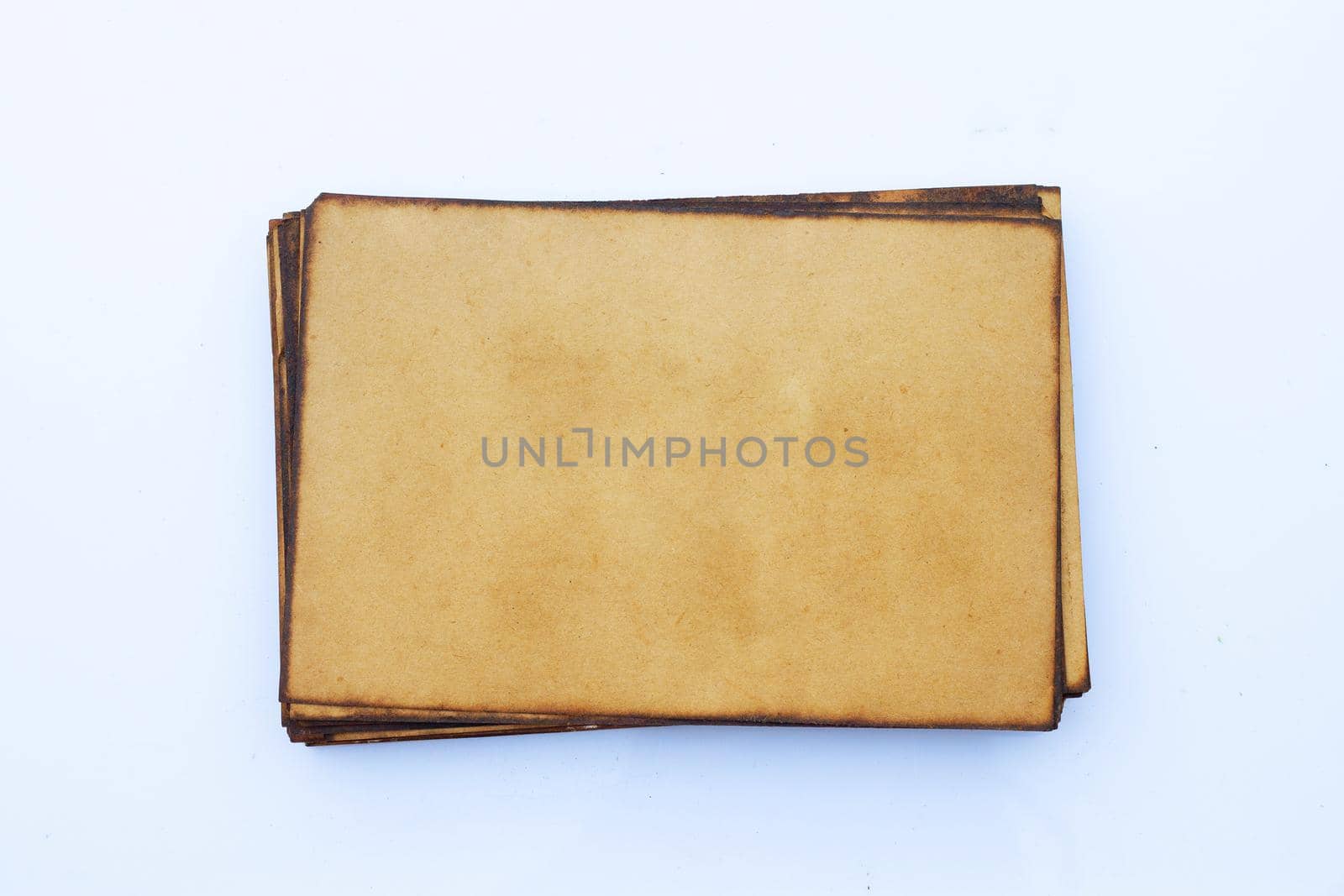 Old brown paper grunge background. Abstract liquid coffee color texture.