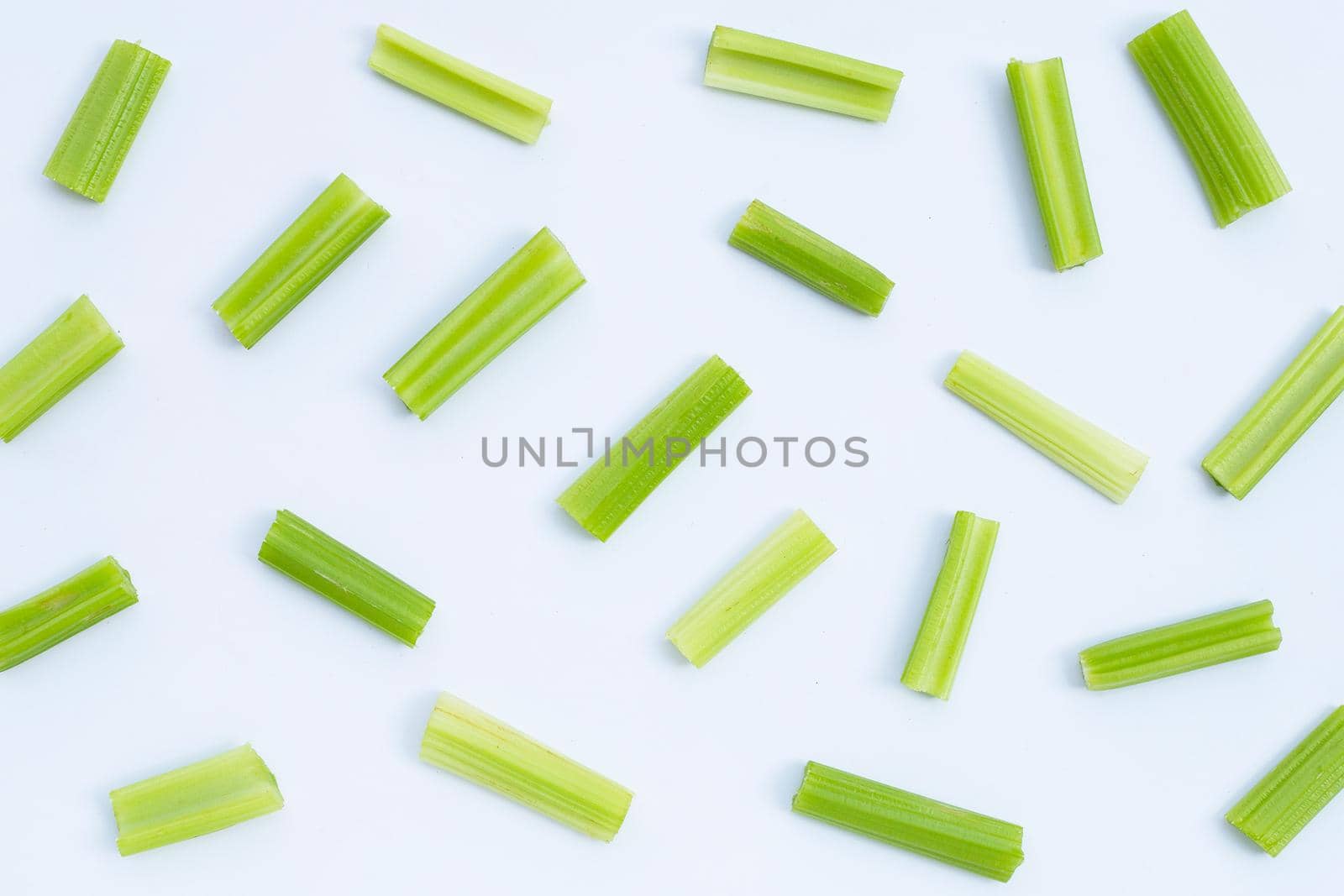Fresh celery on white background. Top view