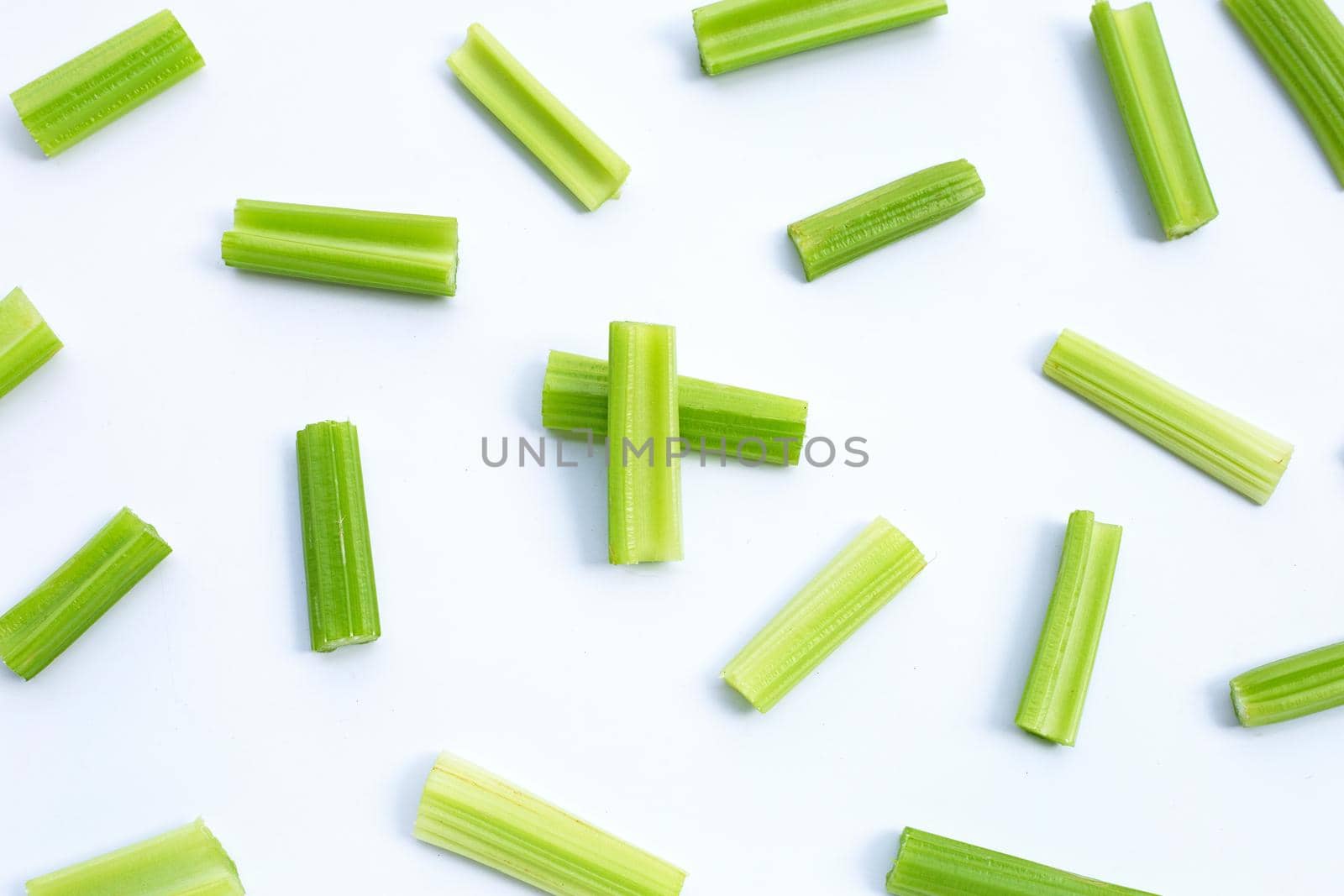 Fresh celery on white background. Top view