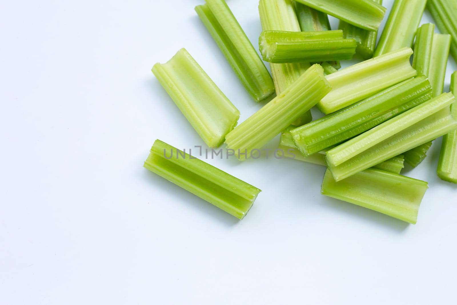 Fresh celery on white background. Top view