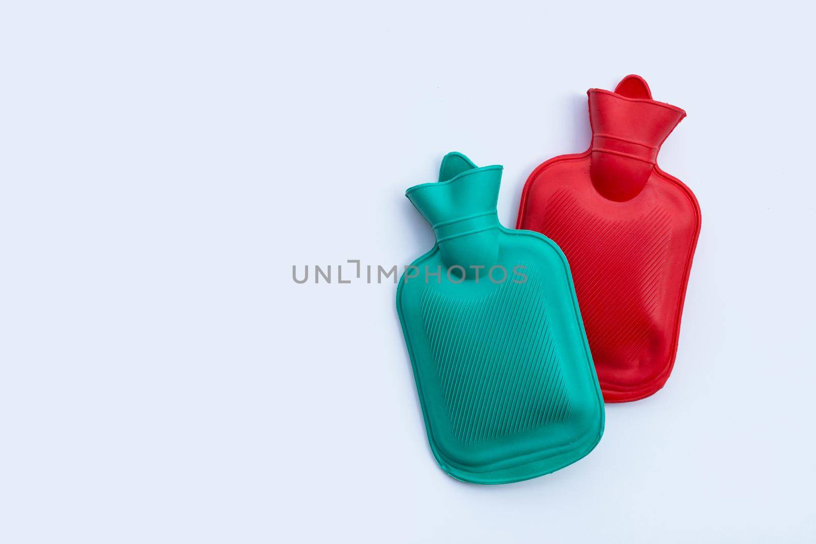 Hot water bags on white background. Copy space