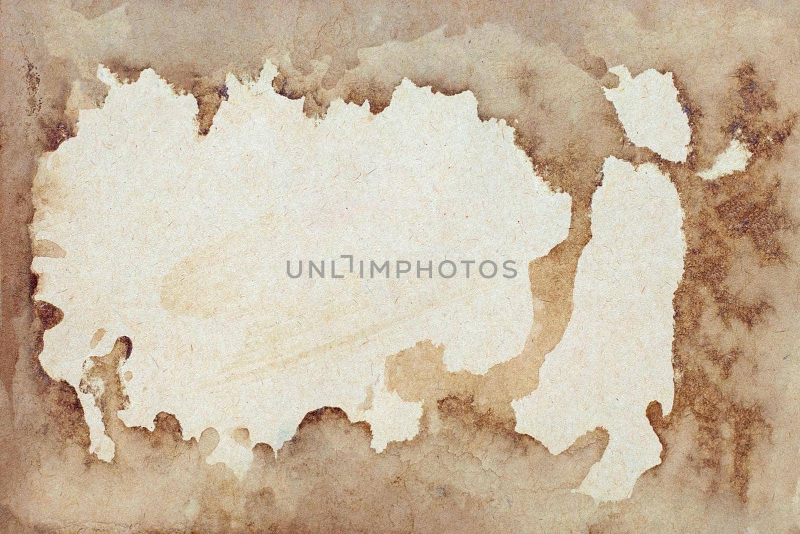 Old brown paper grunge background. Abstract frame liquid coffee color texture.
