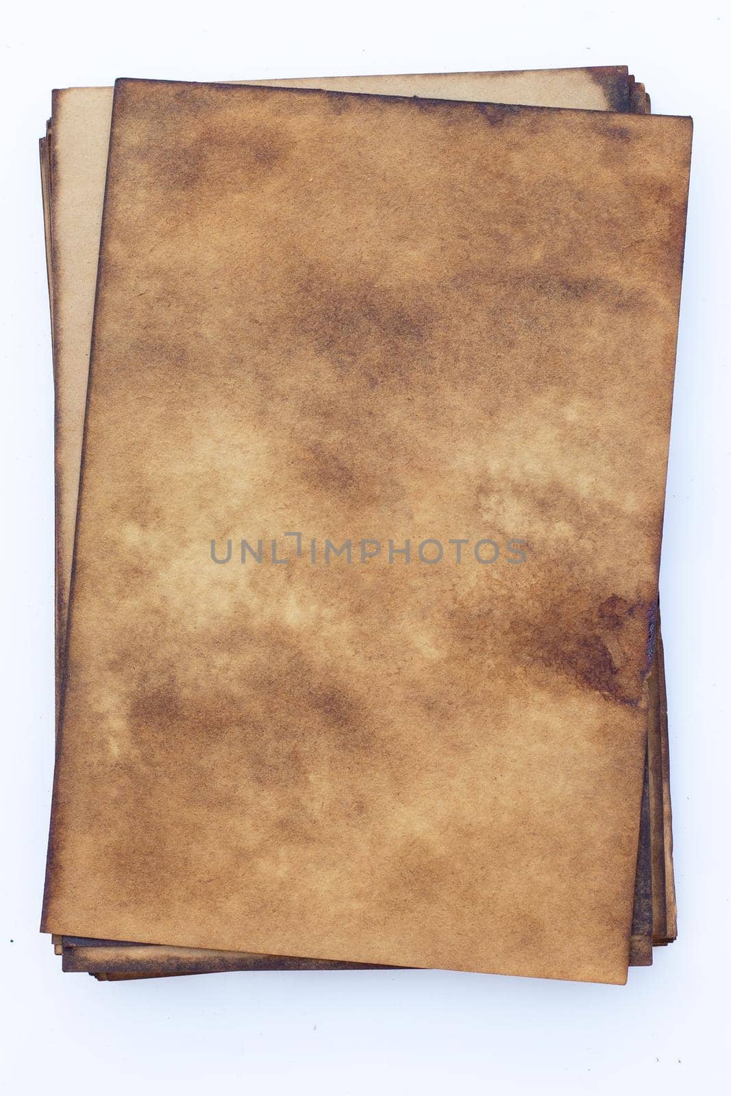 Old brown paper grunge background.  by Bowonpat