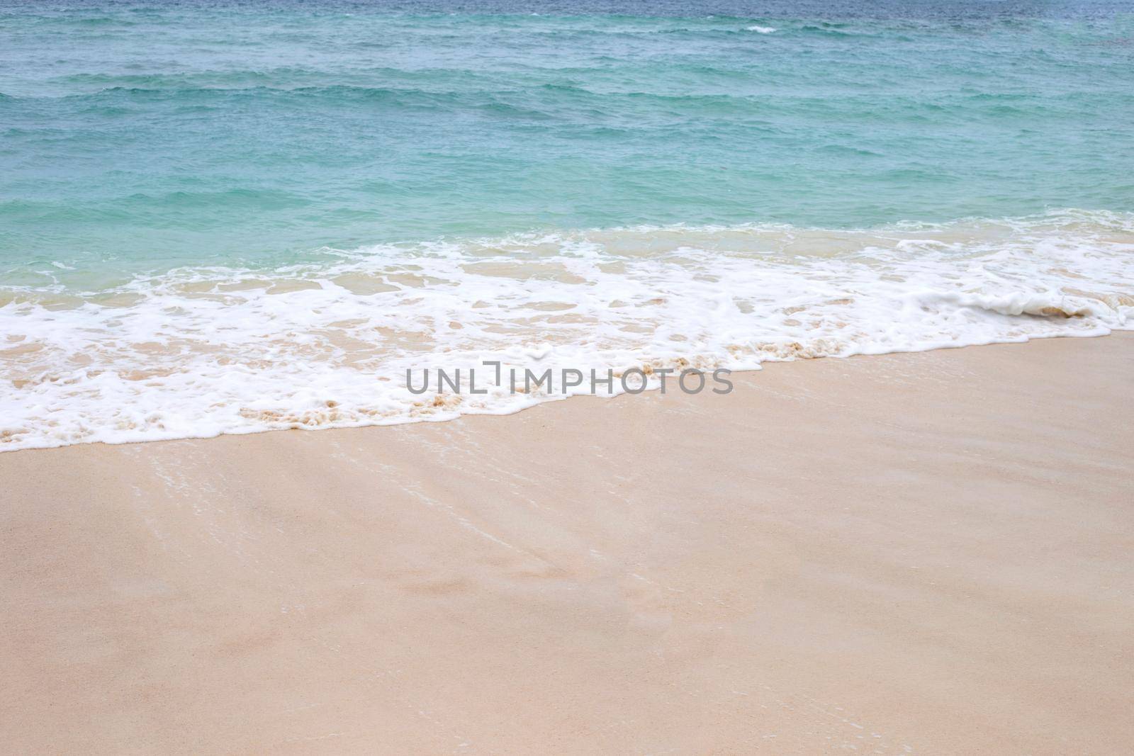 Sea and wave with beach by Bowonpat