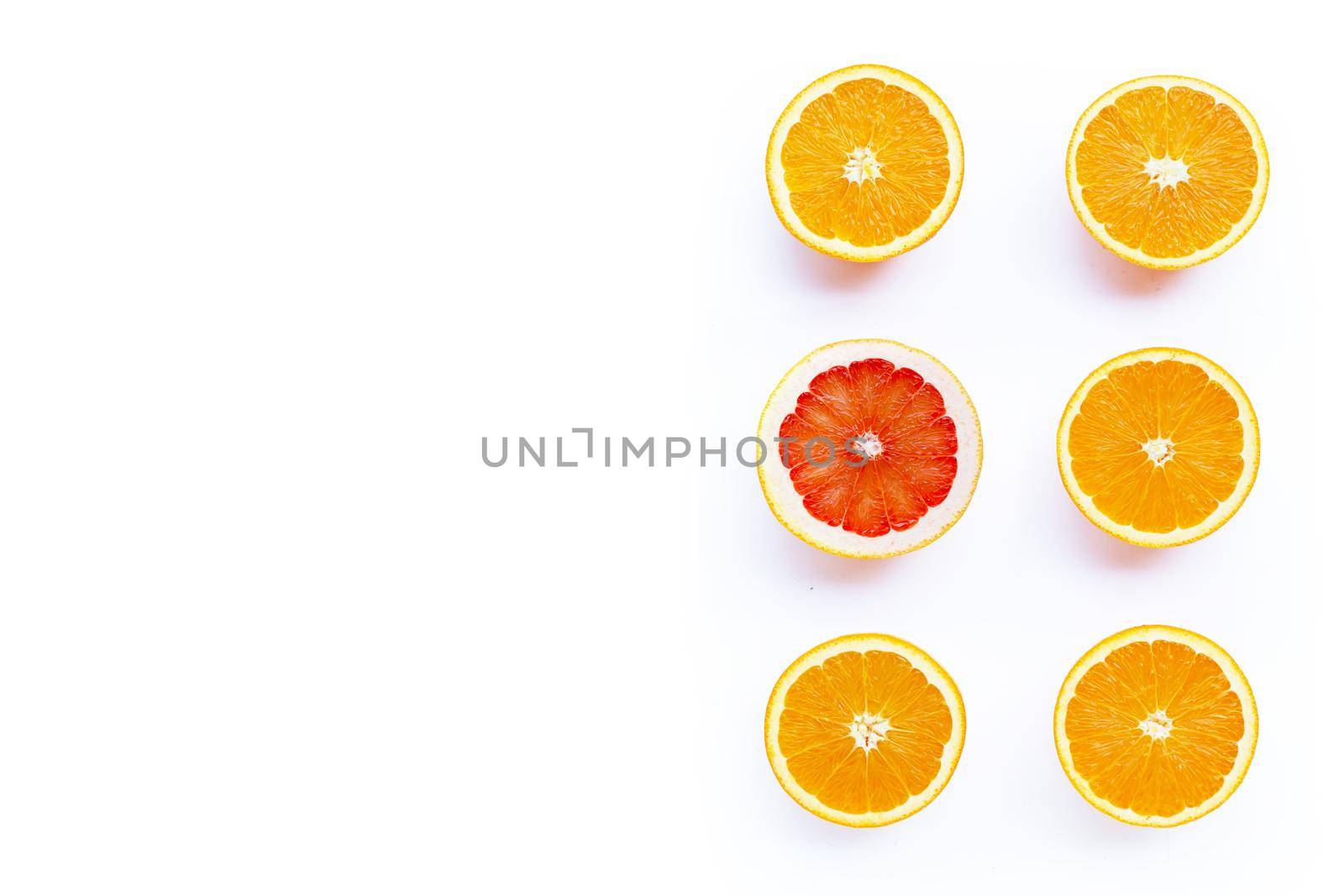 High vitamin C, Juicy and sweet. Fresh orange and grapefruit on white background.