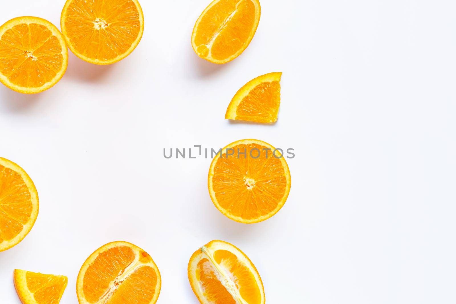 Frame made of fresh orange citrus fruit with leaves isolated on white background. Juicy and sweet