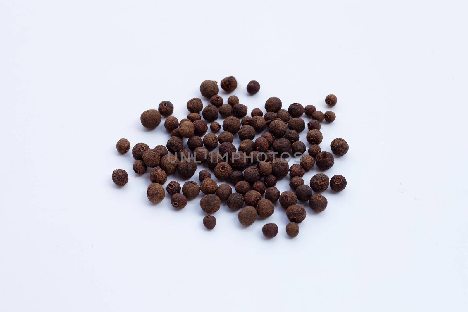 Allspice isolated on white background. Copy space