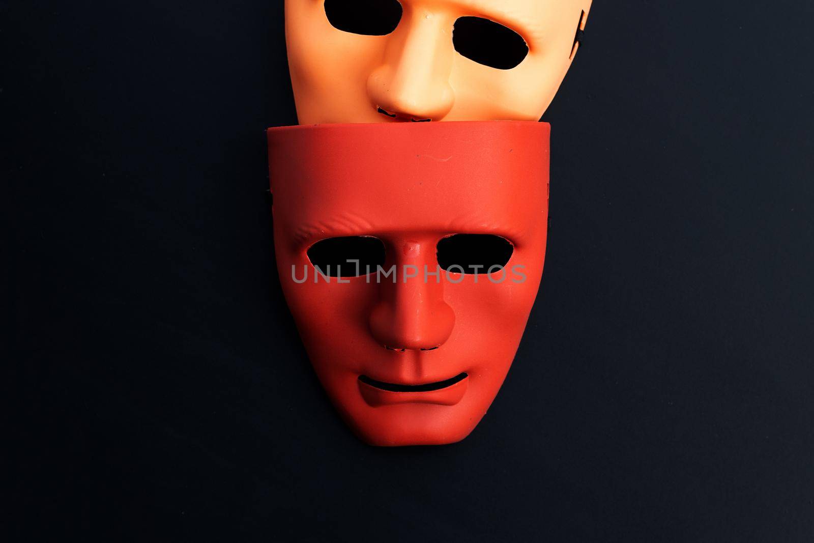 Face masks on dark background. Top view