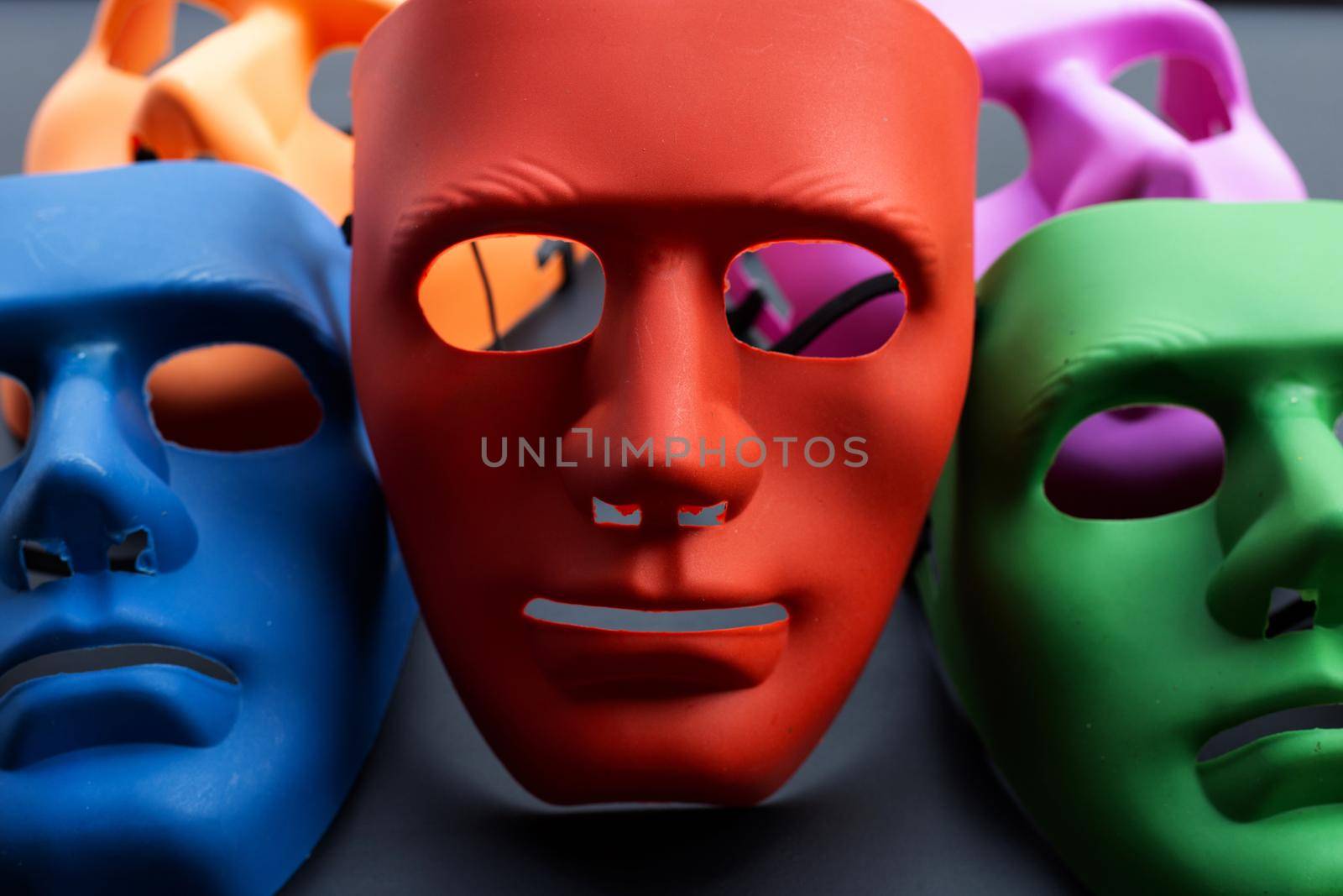 Face masks on dark background.