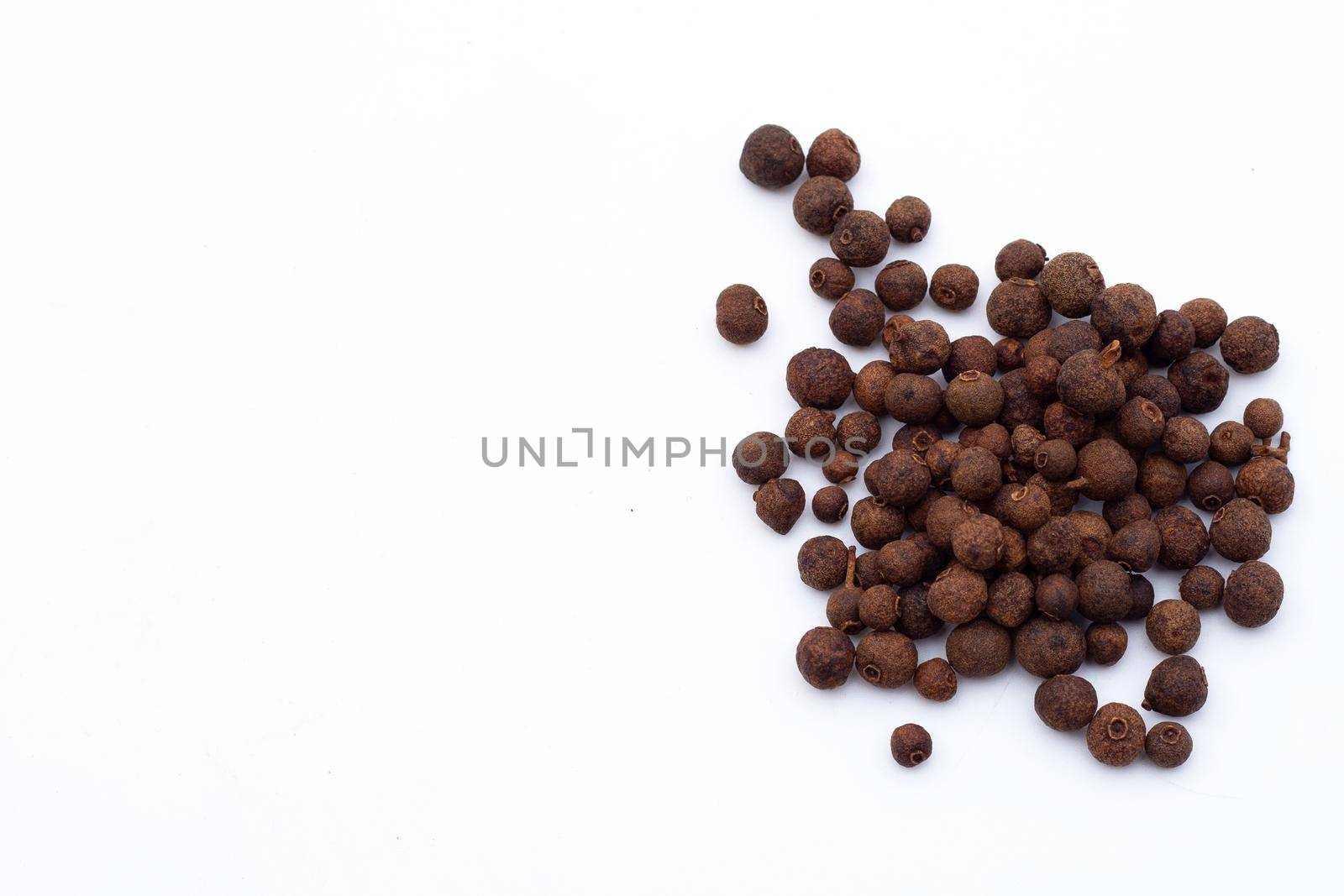 Allspice on white background. Copy space