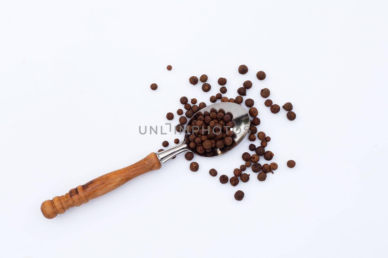 Allspice on white background. Copy space