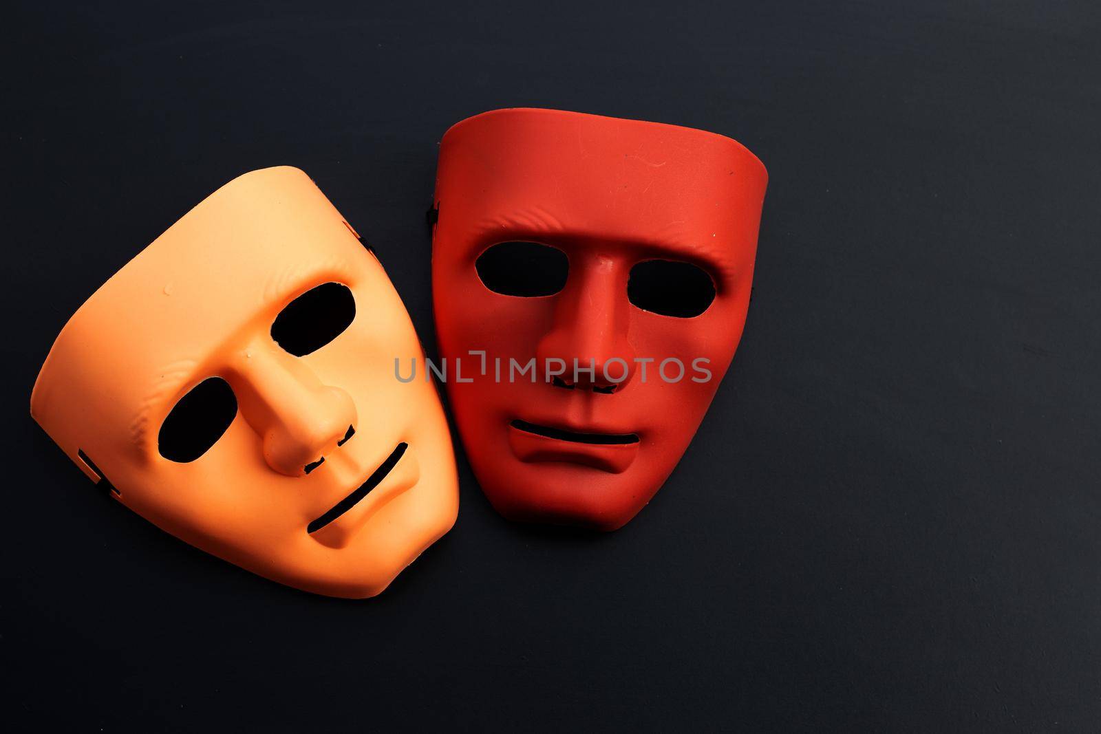 Face masks on dark background. Top view