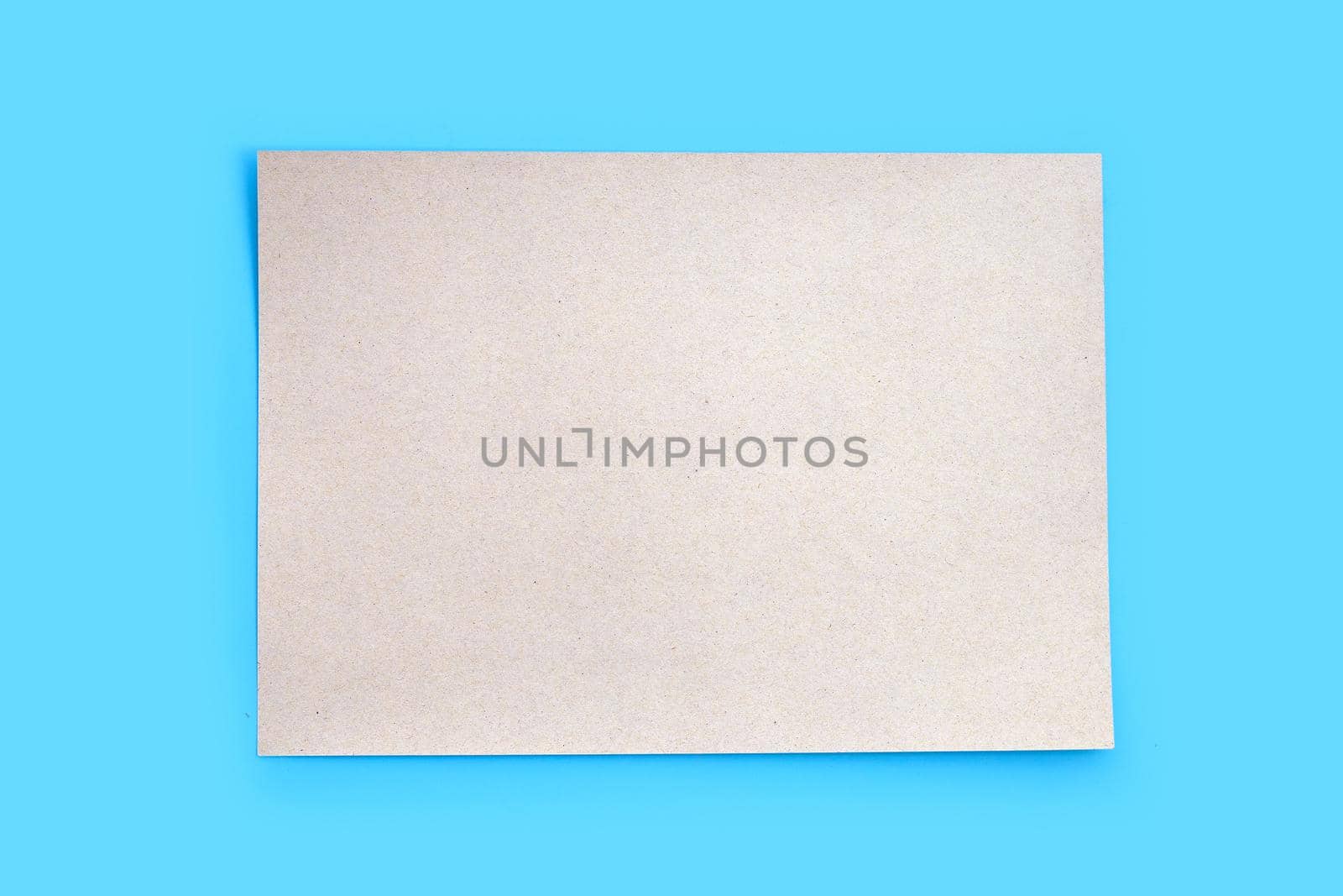 Brown paper texture on blue background.
