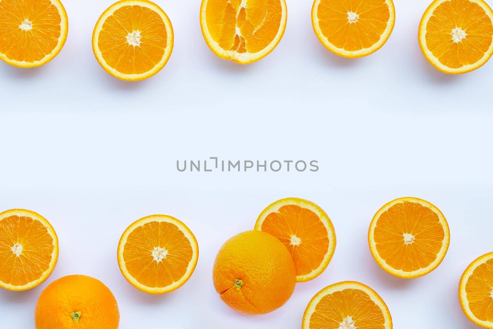 High vitamin C, Juicy and sweet. Frame made of fresh orange fruit on white background.