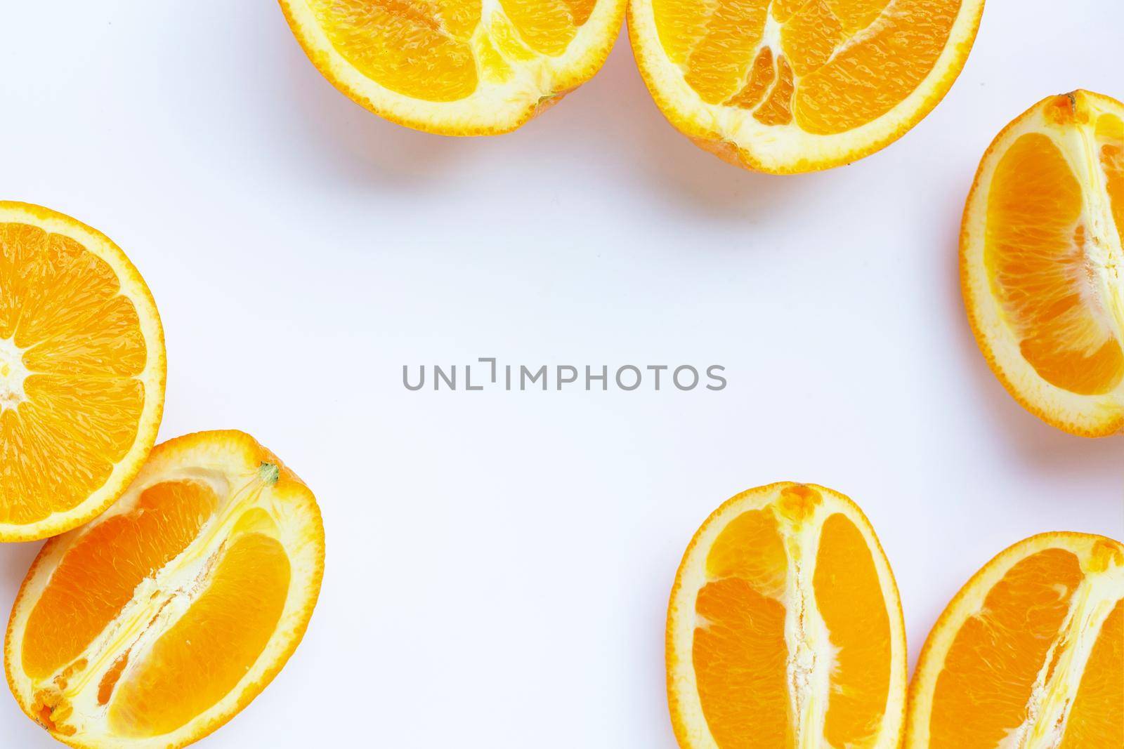 High vitamin C, Juicy and sweet. Frame made of fresh orange fruit on white background.