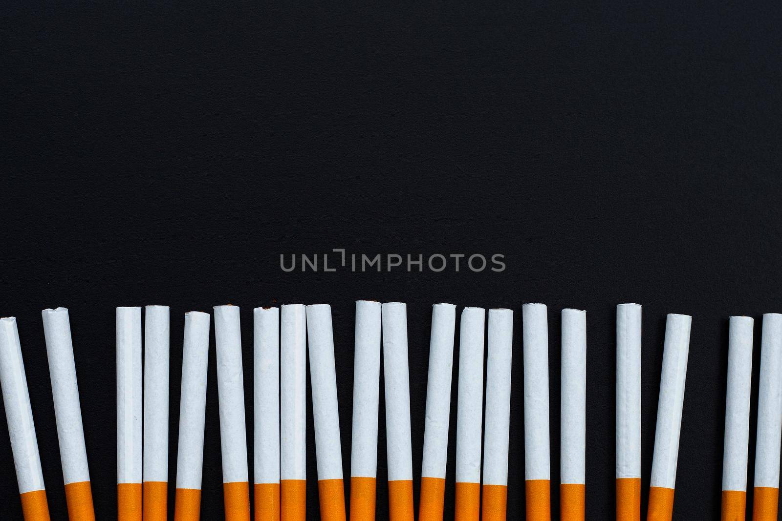 Cigarette on dark background. Non smoking for health concept