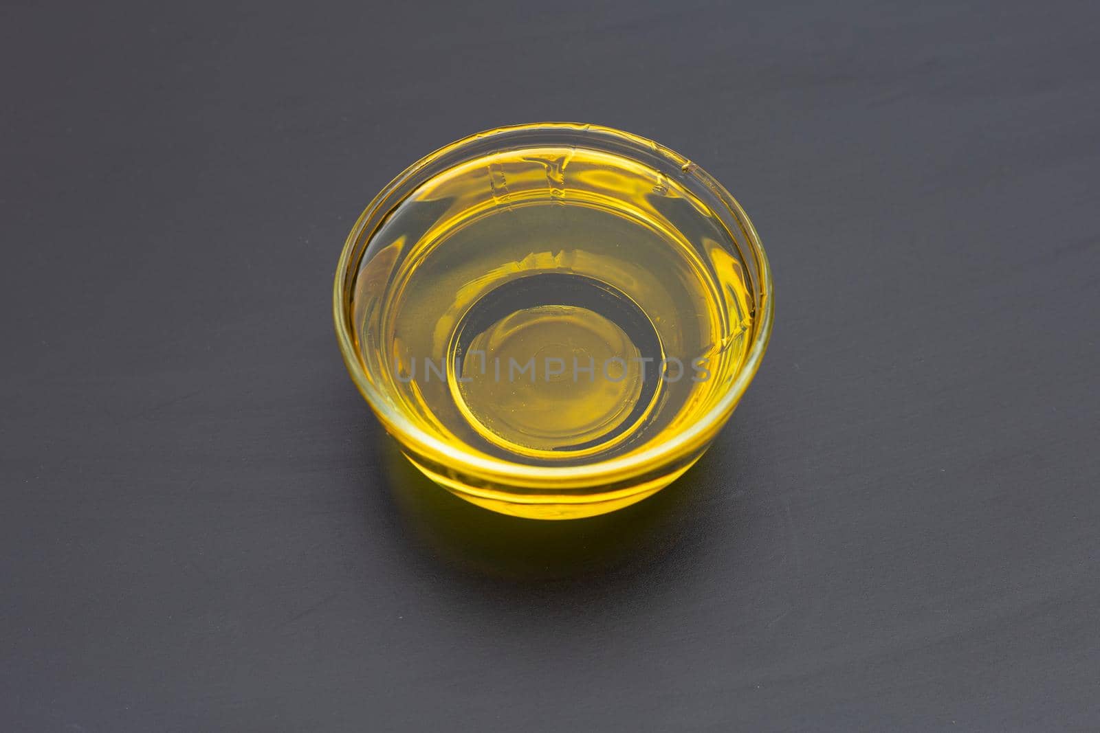 Rice bran oil on dark background.
