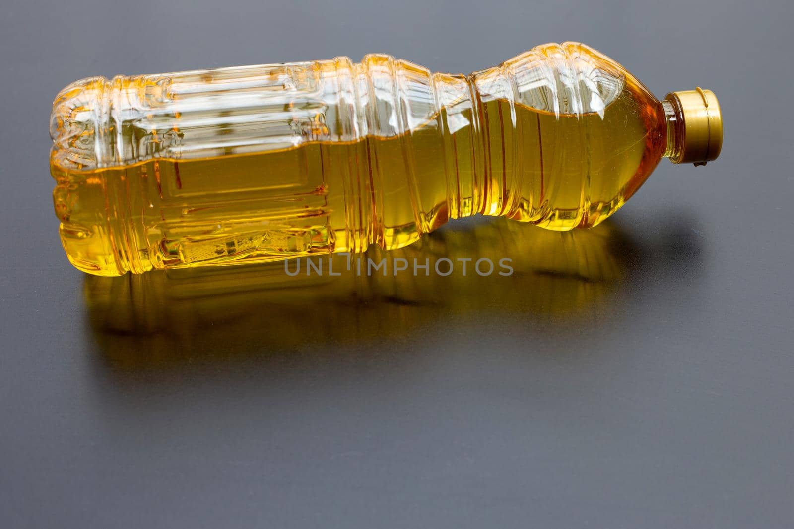 Rice bran oil on dark background.