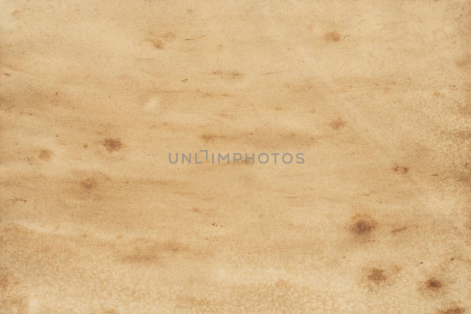 Old brown paper grunge background. Abstract liquid coffee color texture.